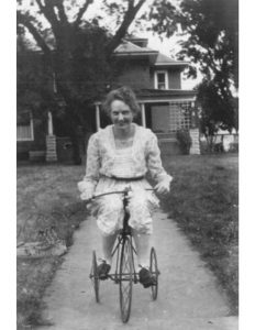 1920 - Maud Rogler rides a bicycle